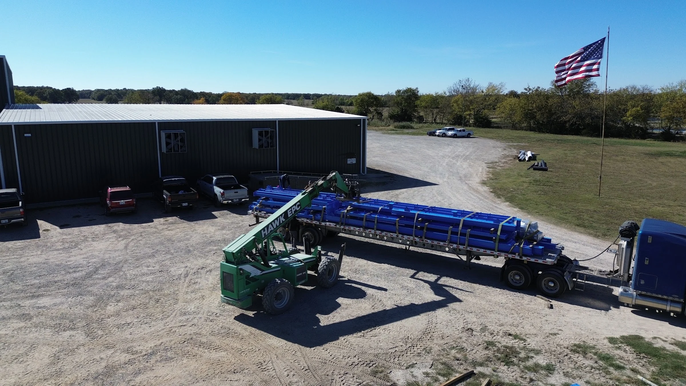The Hawk Fabrication shop with the flag flying