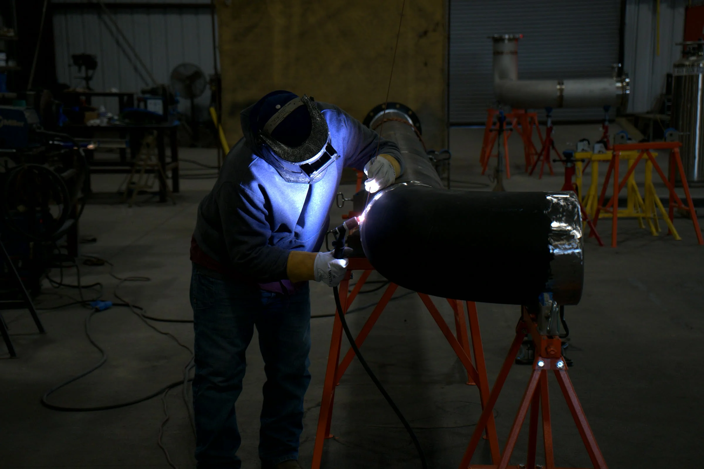 Finished result, a welder on pipe