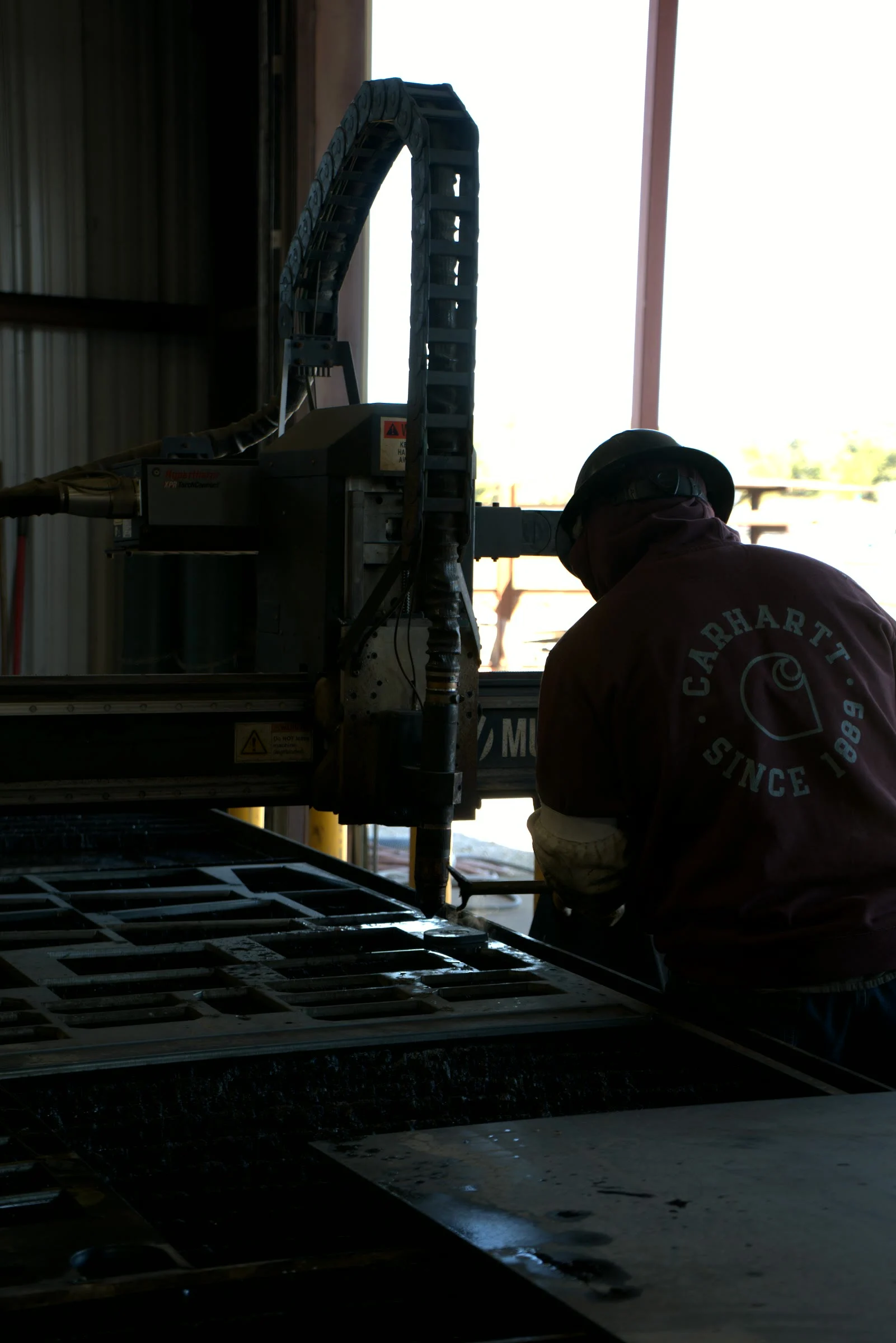 Hawk Fabrication shop floor, the drill line